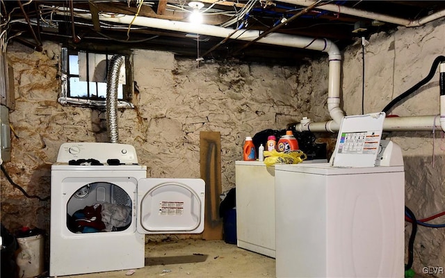 laundry area featuring washing machine and dryer