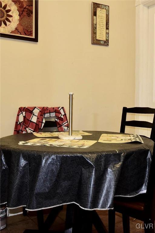 dining room featuring bar area