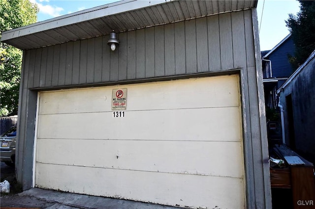 garage with wood walls