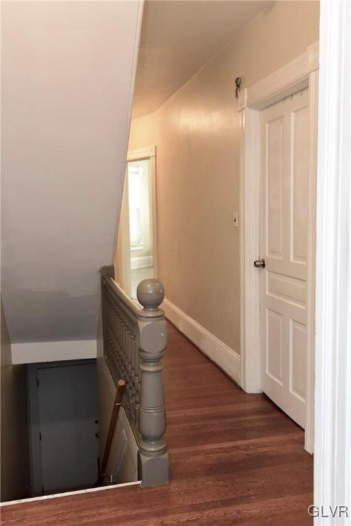 hall featuring dark hardwood / wood-style flooring