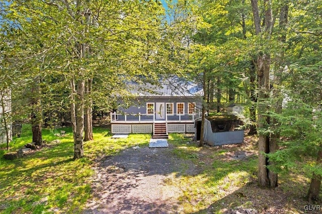 view of front of property featuring a deck