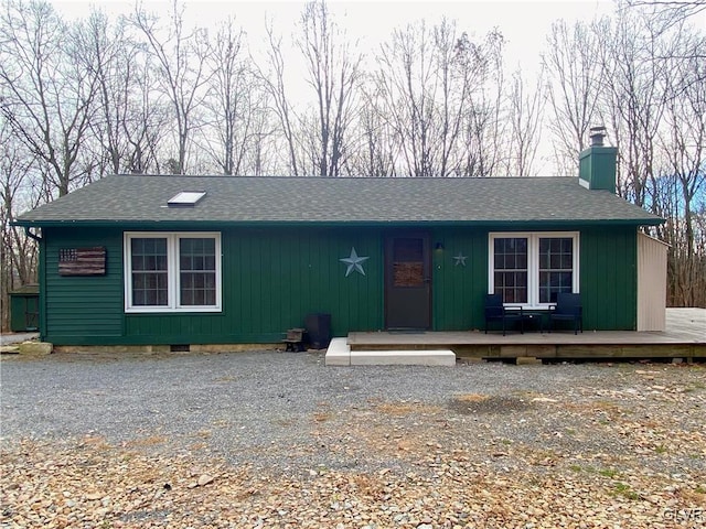 view of front of property with a wooden deck