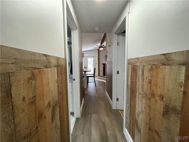 hall with dark hardwood / wood-style flooring