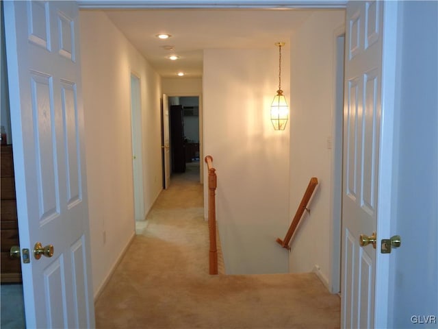 144 Dogwood Dr, Penn Forest Township, PA 18229 - hallway featuring an upstairs landing, light colored carpet, baseboards, and recessed lighting