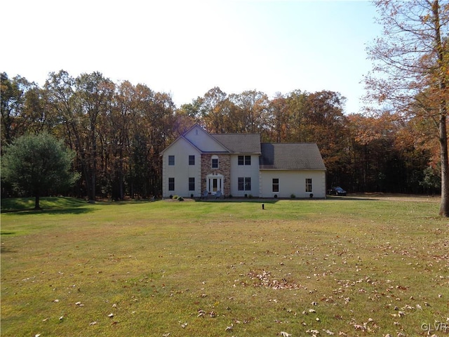 144 Dogwood Dr, Penn Forest Township, PA 18229 - view of front of house featuring stone siding and a front lawn