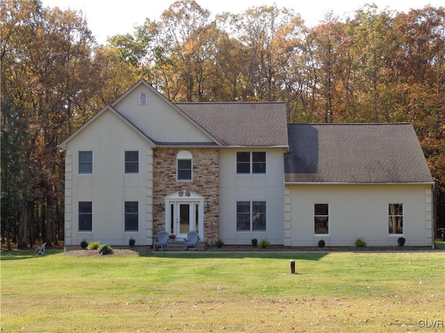 view of front of property with a front lawn