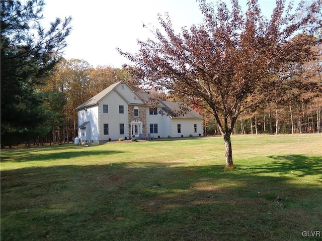 144 Dogwood Dr, Penn Forest Township, PA 18229 - view of side of home with a yard