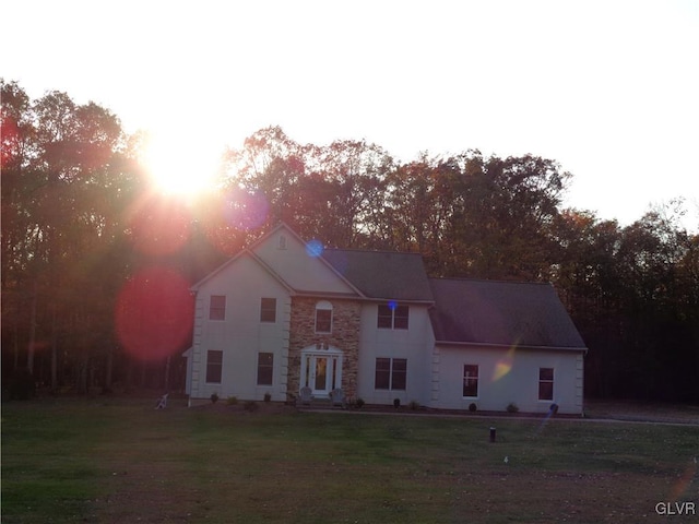 colonial house with a yard