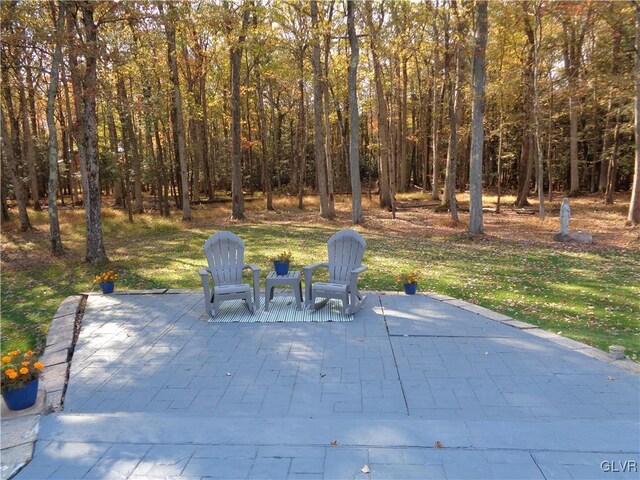 144 Dogwood Dr, Penn Forest Township, PA 18229 - view of patio / terrace with a view of trees