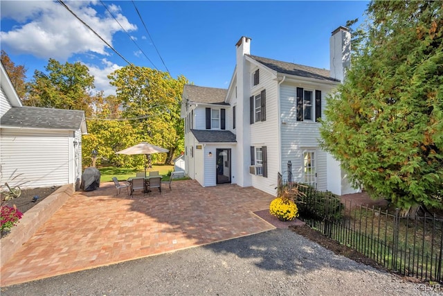 view of front of house featuring a patio