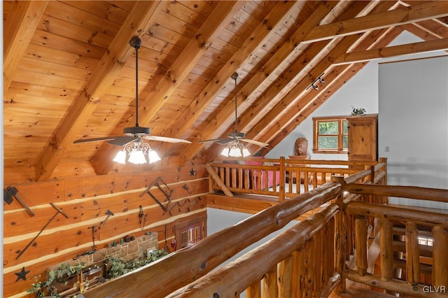 interior space with wooden ceiling and lofted ceiling with beams