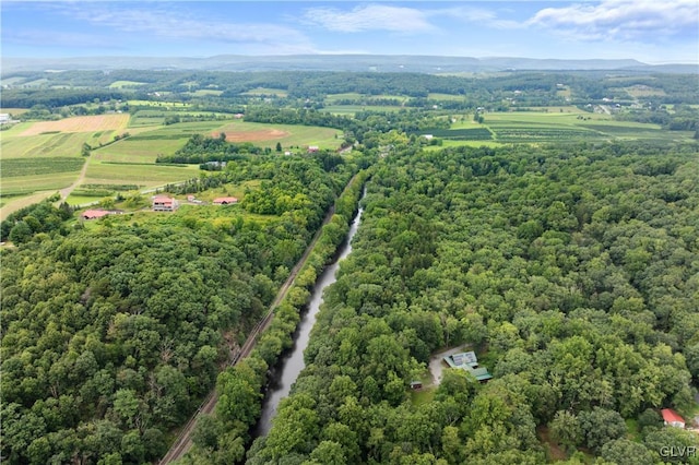 birds eye view of property with a rural view