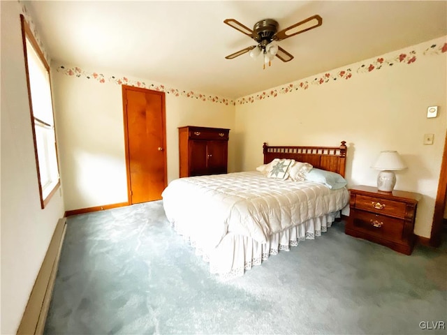 carpeted bedroom with ceiling fan