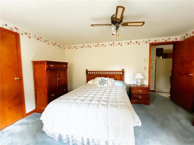 carpeted bedroom featuring ceiling fan