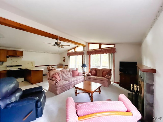 living room with lofted ceiling with beams and ceiling fan