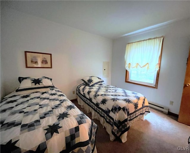 bedroom with carpet and a baseboard heating unit