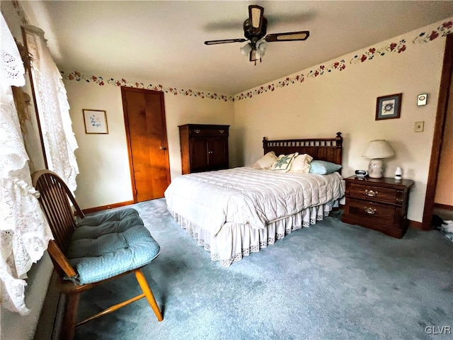 carpeted bedroom featuring ceiling fan