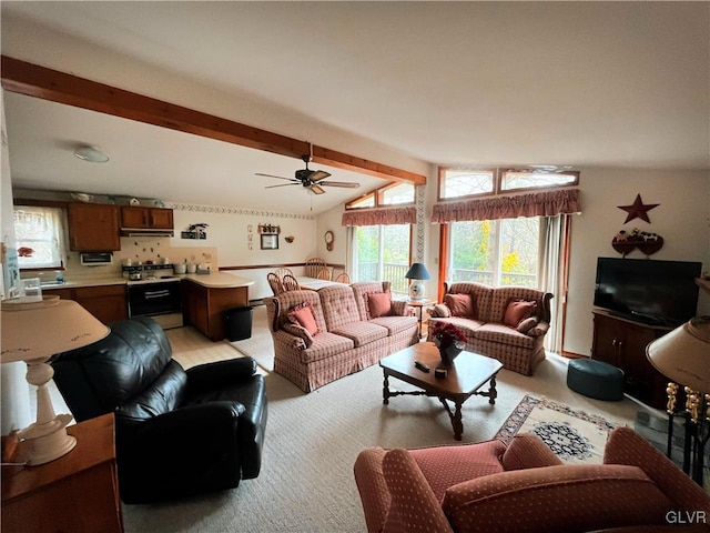 living room with lofted ceiling with beams and ceiling fan