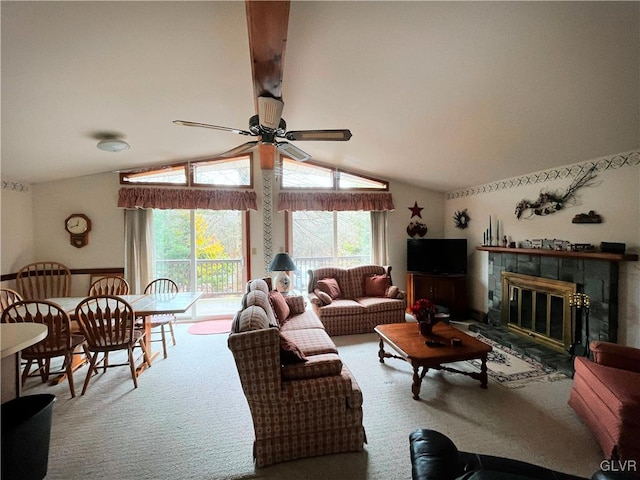 living room with a fireplace, ceiling fan, vaulted ceiling, and carpet flooring