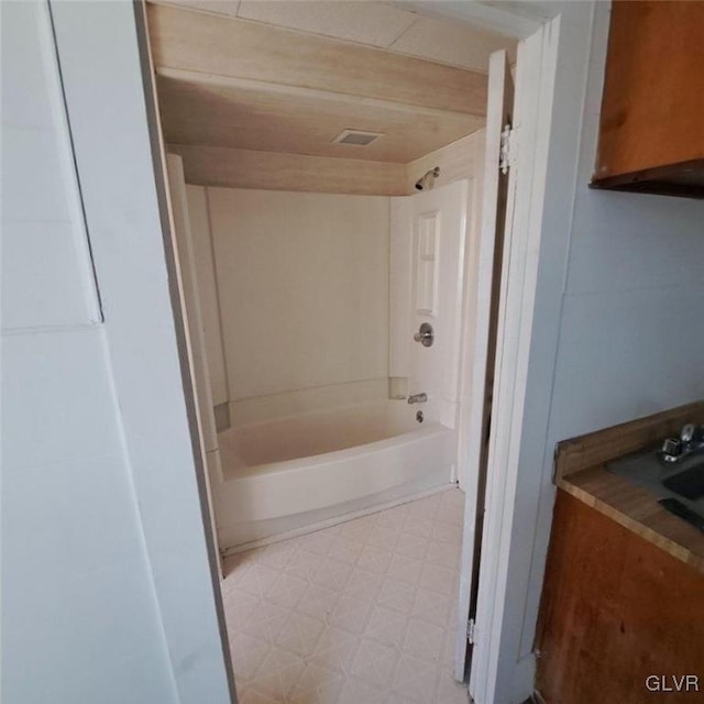 bathroom featuring  shower combination