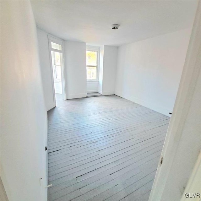 empty room with light wood-type flooring