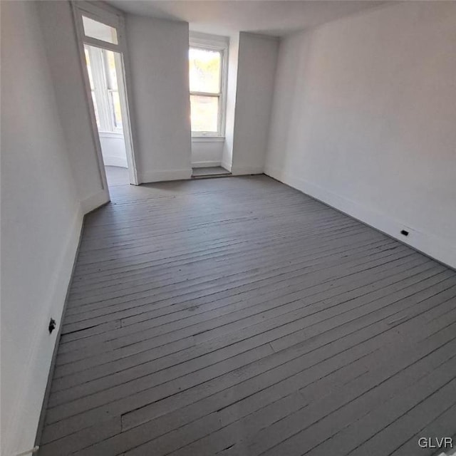 spare room featuring light hardwood / wood-style flooring