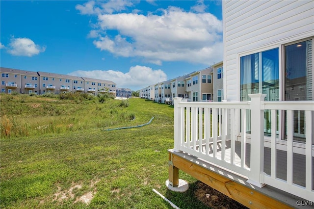 view of yard with a deck