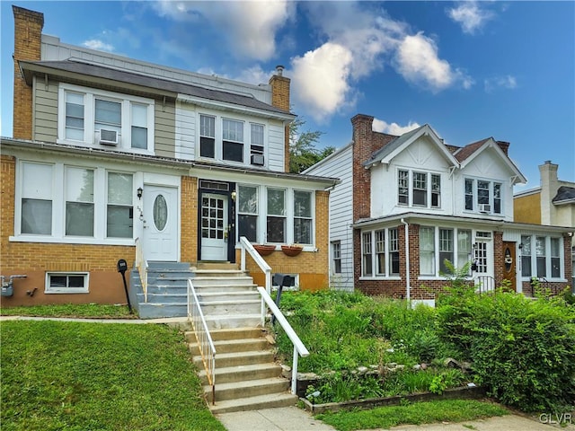 view of front of home with cooling unit