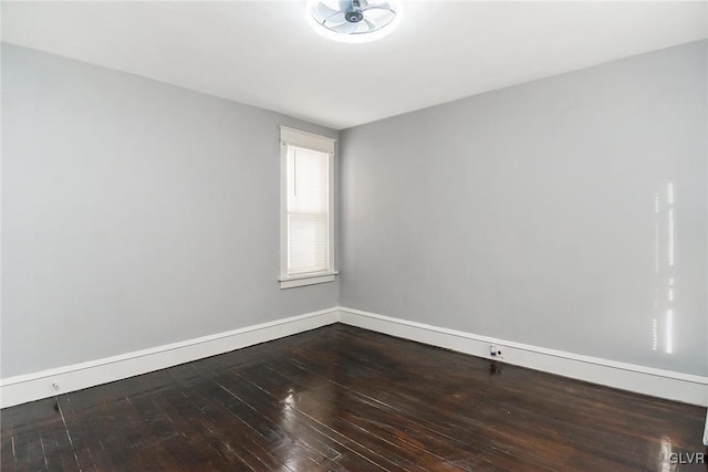 spare room featuring hardwood / wood-style flooring