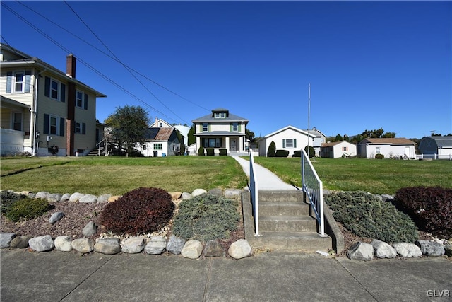 view of front of house with a front lawn