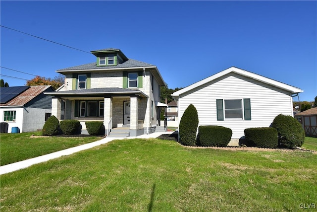 view of front of home with a front yard