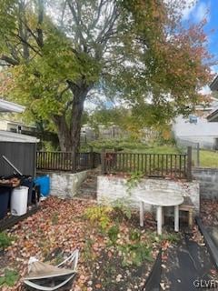 view of yard featuring a wooden deck