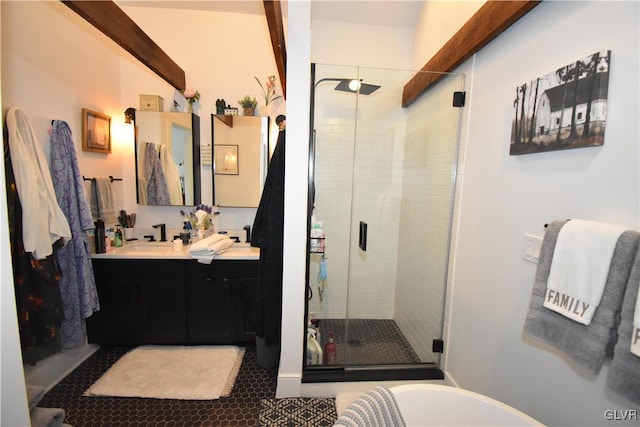 bathroom featuring vanity, plus walk in shower, and tile patterned floors