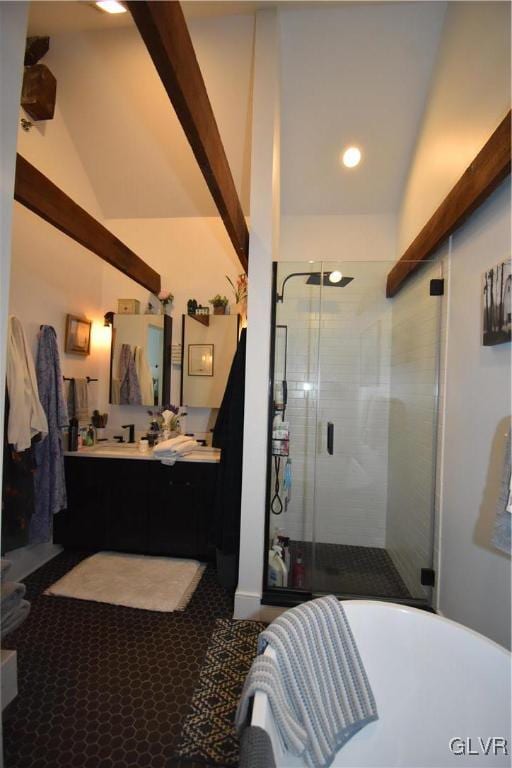 bathroom featuring vanity, lofted ceiling, and plus walk in shower