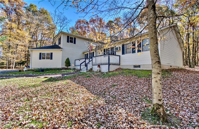 view of front of house with a deck