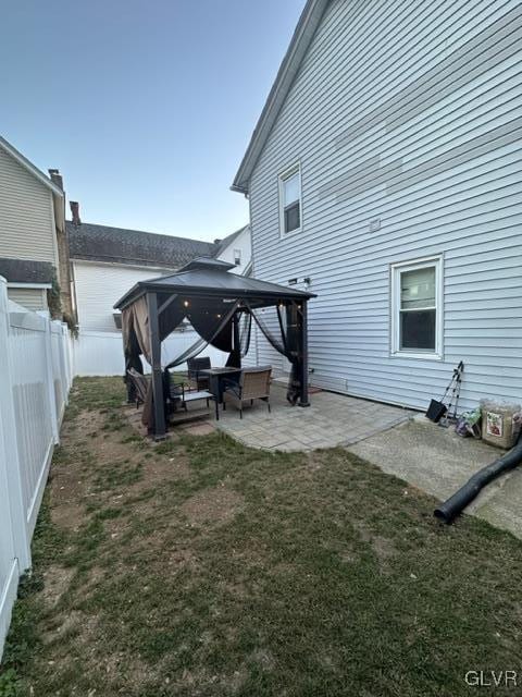 view of yard featuring a gazebo and a patio area