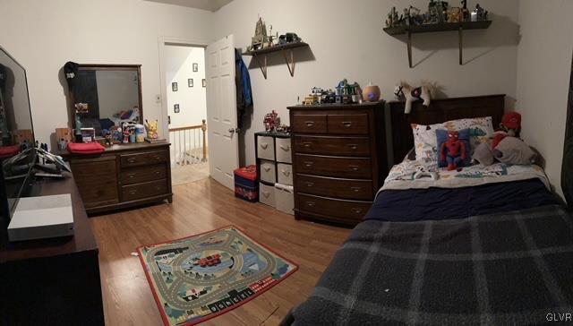 bedroom featuring light wood-type flooring