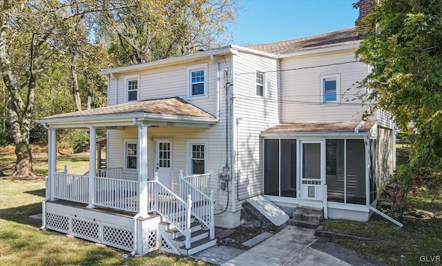 3331 Walnut St, Bethlehem Twp, PA 18020 - rear view of house with covered porch, a sunroom, a chimney, a shingled roof, and entry steps