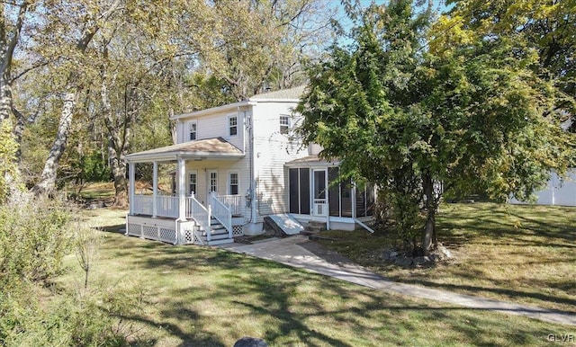 3331 Walnut St, Bethlehem Twp, PA 18020 - rear view of property with a lawn and a porch