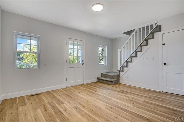 3331 Walnut St, Bethlehem Twp, PA 18020 - entrance foyer featuring stairs, light wood-type flooring, and baseboards