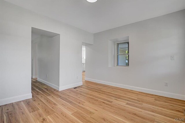 3331 Walnut St, Bethlehem Twp, PA 18020 - empty room with light wood finished floors and baseboards
