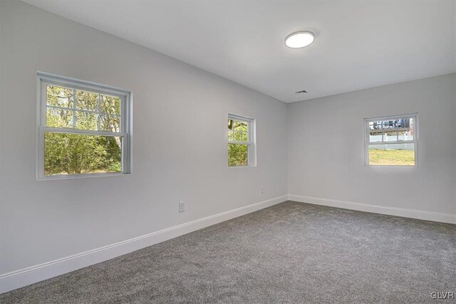 3331 Walnut St, Bethlehem Twp, PA 18020 - carpeted empty room featuring baseboards