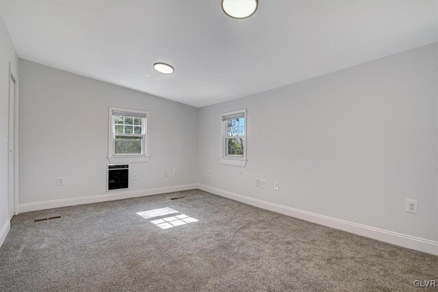 3331 Walnut St, Bethlehem Twp, PA 18020 - carpeted spare room featuring baseboards and heating unit
