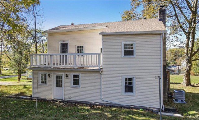 3331 Walnut St, Bethlehem Twp, PA 18020 - back of property with a chimney, a balcony, a yard, and cooling unit