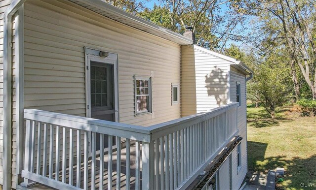 3331 Walnut St, Bethlehem Twp, PA 18020 - view of side of home featuring a chimney and a lawn