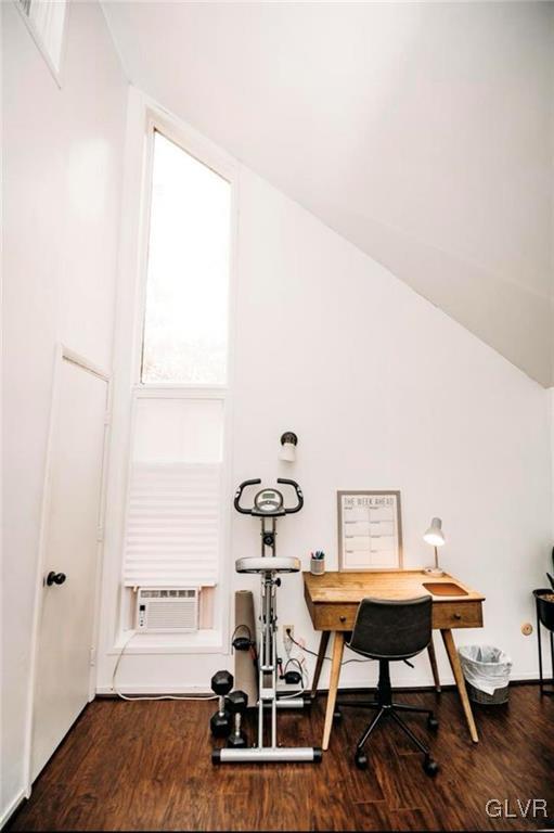 office space with cooling unit and dark hardwood / wood-style floors