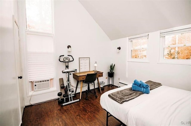 bedroom with dark wood-type flooring, cooling unit, vaulted ceiling, and a baseboard heating unit