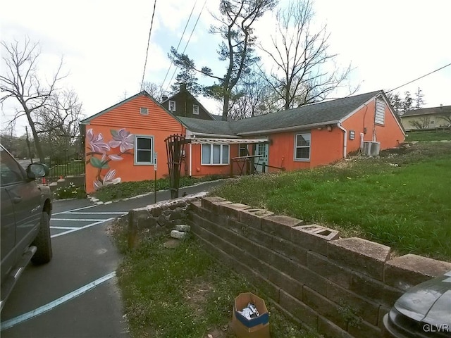 view of front of property with central AC