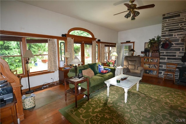 living room with ceiling fan, wood-type flooring, and french doors