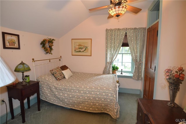 bedroom with ceiling fan, baseboards, lofted ceiling, and carpet floors